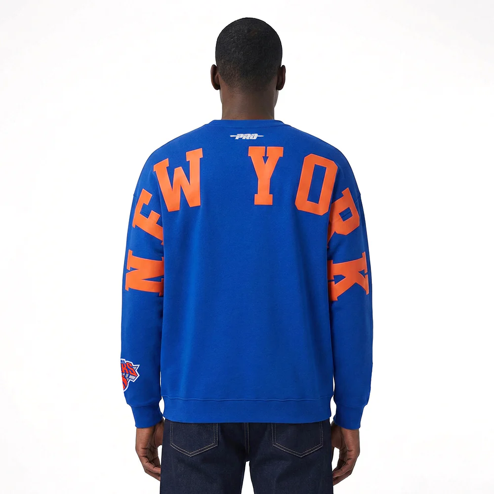 NBA NEW YORK KNICKS WINGSPAN MEN'S DROP SHOULDER FLEECE CREWNECK (ROYAL BLUE)