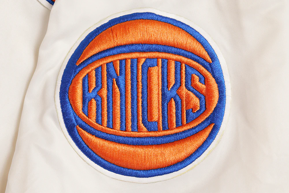 NBA NEW YORK KNICKS RETRO CLASSIC MEN'S RIB SATIN JACKET (EGGSHELL/ ROYAL BLUE) - Image 6
