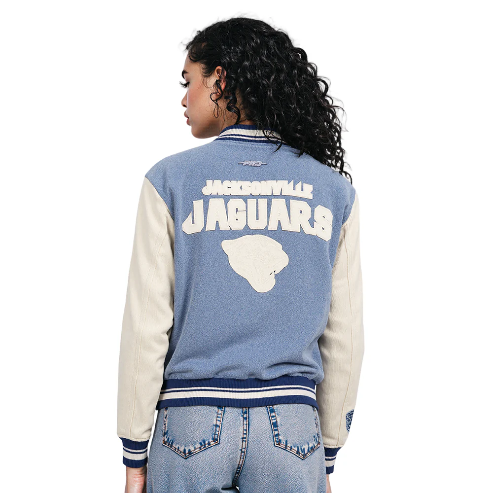 NFL JACKSONVILLE JAGUARS VARSITY BLUES WOMEN'S DENIM VARSITY JACKET (DENIM/LINEN) - Image 11